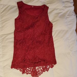 red lace tank top with a scoop neck and scalloped hem. Small